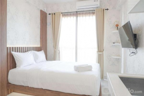 Warm and Cozy Stay Studio Apartment at Sky House BSD By Travelio